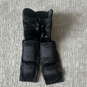 Black football pants, all-in-one pads